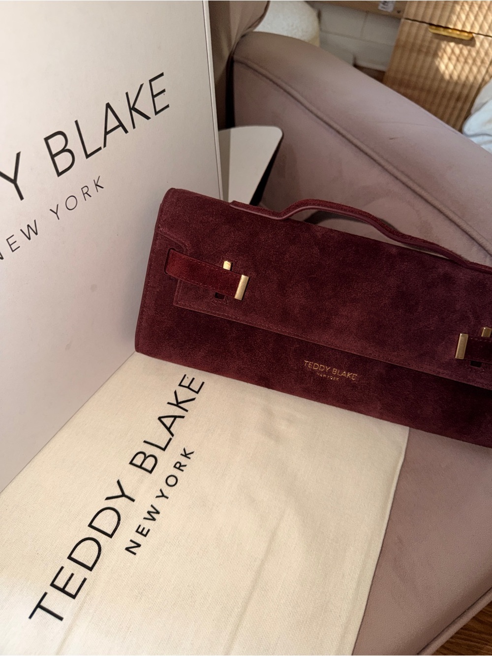 Teddy Blake Burgundy Suede Top-Handle Clutch with Gold Accents